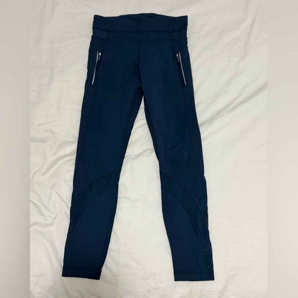 Lululemon women’s leggings, teal green